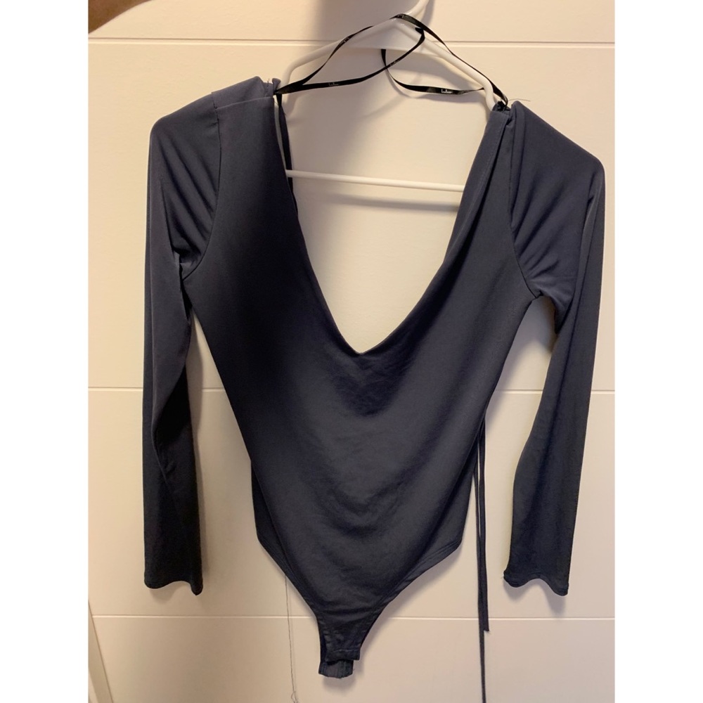 Never worn Lulu’s body suit